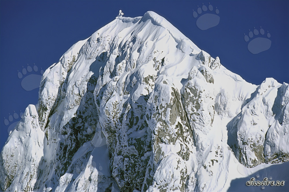Snow-covered Westliche Karwendelspitze in Mittenwald, Bavaria, Germany