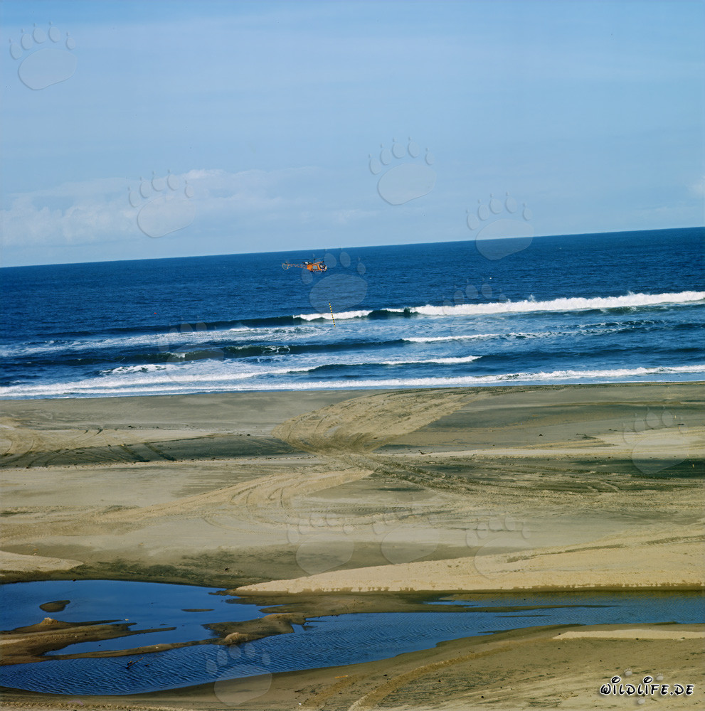 Sounding with helicopter in the surf zone