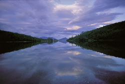 Experience the evening at Lake Coville in the heart of Alaska's wilderness