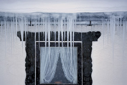 Discover Majestic Icicles at the Window in Mittenwald, Bavaria