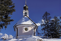Romantic Christmas Chapel in the Snowy Bavarian Mountains