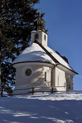 Romantic Christmas Chapel in the Snowy Mountains of Bavaria