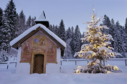 Romantic Mountain Christmas in Bavaria with Festive Chapel and Christmas Tree