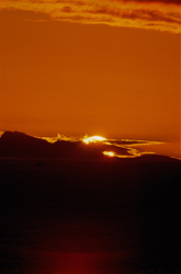 Romantic sunset over the sea in Walker Bay, South Africa