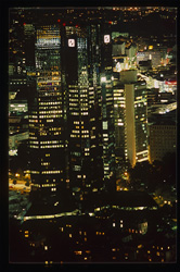 Experience the Imposing Presence of the Commerzbank Tower in Frankfurt at Night