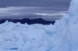 Experience the fascinating pack ice landscape of Cape Anne in Nunavut, Canada