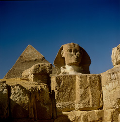 Front view of the Great Sphinx of Giza with Chephren Pyramid