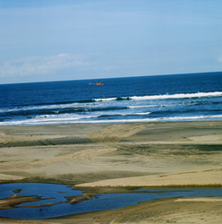 Professional sounding with helicopter in the dangerous surf zone of Richards Bay