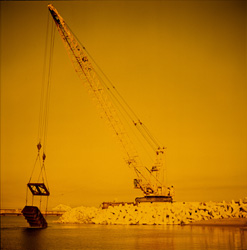 Spectacular shots of the installation of stones at North Breakwater at sunset