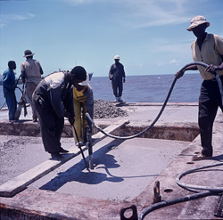 Heavy compactors in action on North Breakwater for concrete work