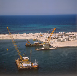 Crane barge preparing the foundation surface in Ras el Tin Harbor, Alexandria