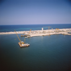 Impressive crane barge with block yard and measuring rods in Alexandria Egypt