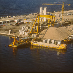 Transport pontoon is loaded with concrete blocks in Ras el Tin Harbor, Alexandria
